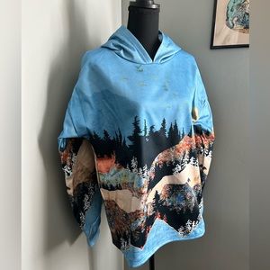 2 Women’s graphic mountain print polyester hoodies w/o drawstrings, XL, NWOT.